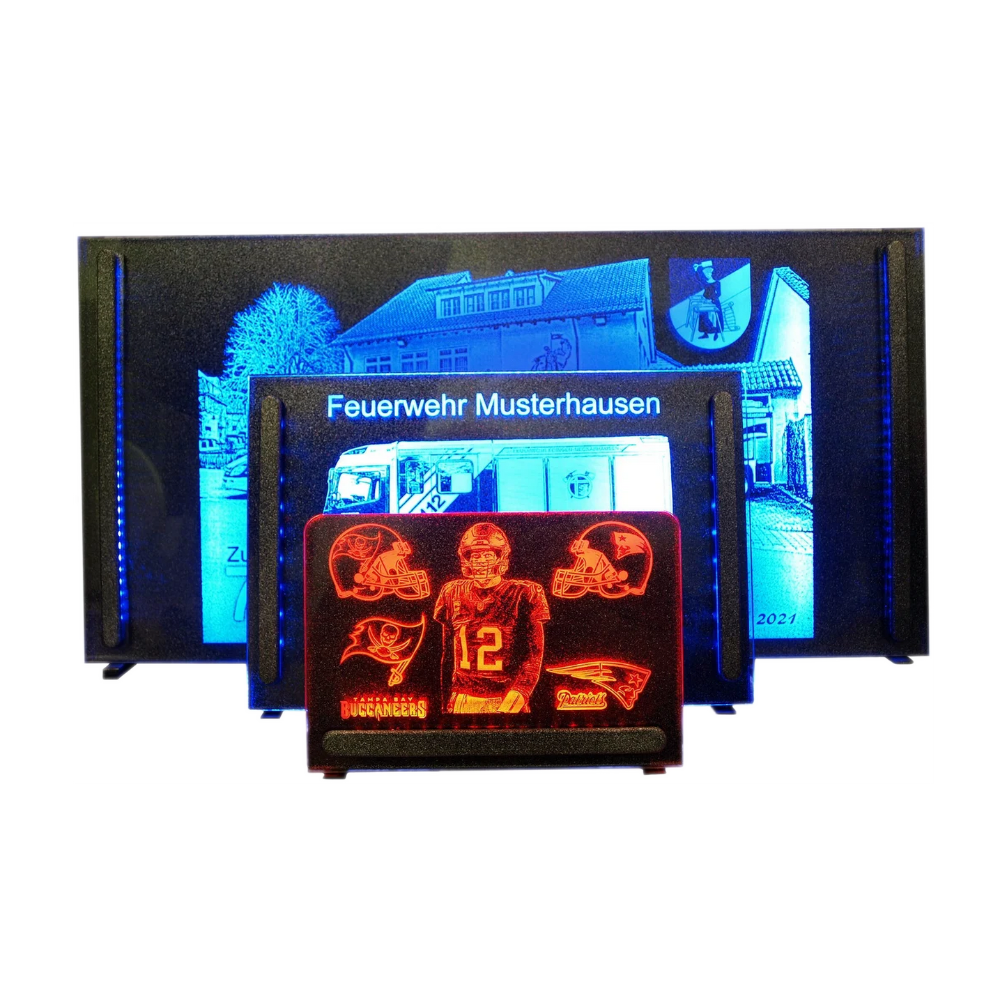 Drei beleuchtete Acrylbilder in verschiedenen Größen