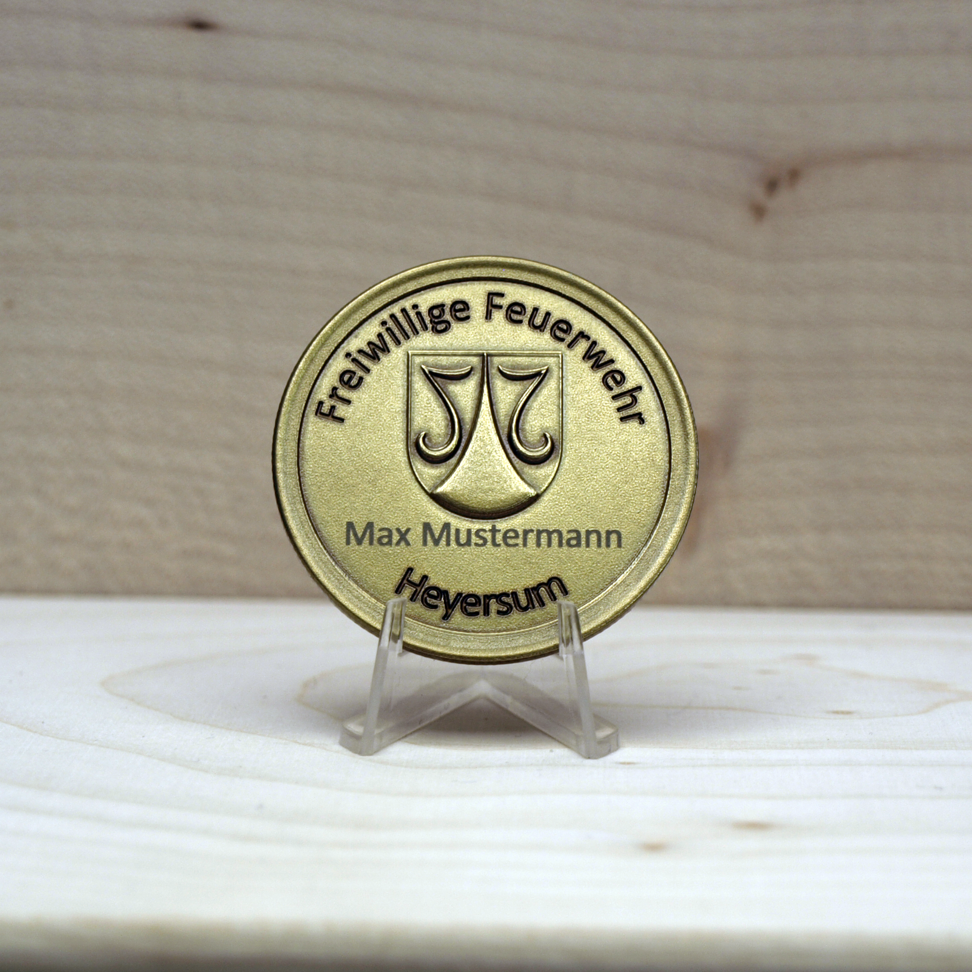 Münze mit Tiefen- und Oberflächengravur